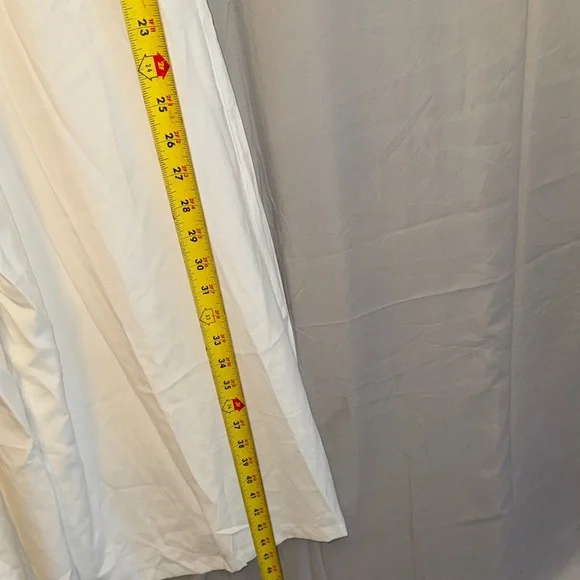 Elegant White Sleeveless Jumpsuit - Picture 11 of 13